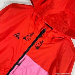 NIKE ACG 2.5L Packable Rain Jacket | Habanero Red/Lotus Pink | Men's | SMALL